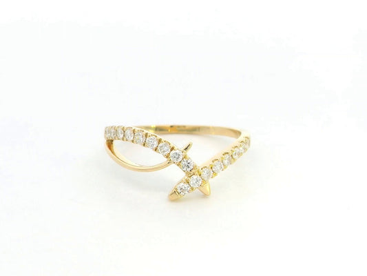 Diamond criss cross ring in 18K yellow gold by Emirates Diamonds