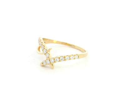 Diamond criss cross ring in 18K yellow gold by Emirates Diamonds