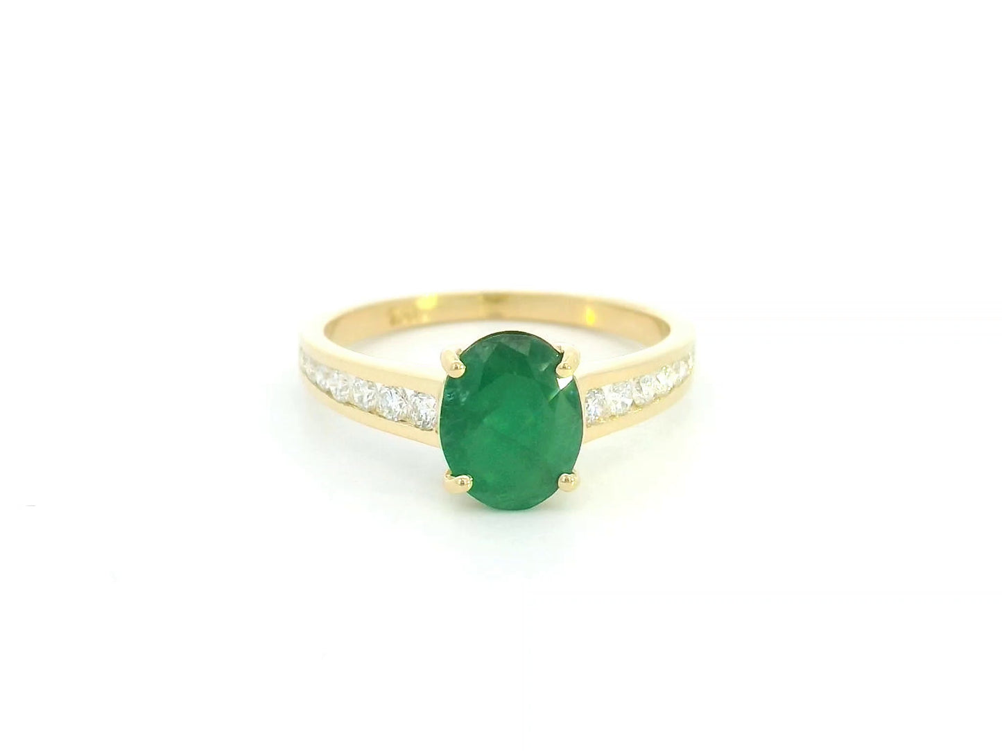 Oval emerald and diamond ring in 18K yellow gold by Emirates Diamonds