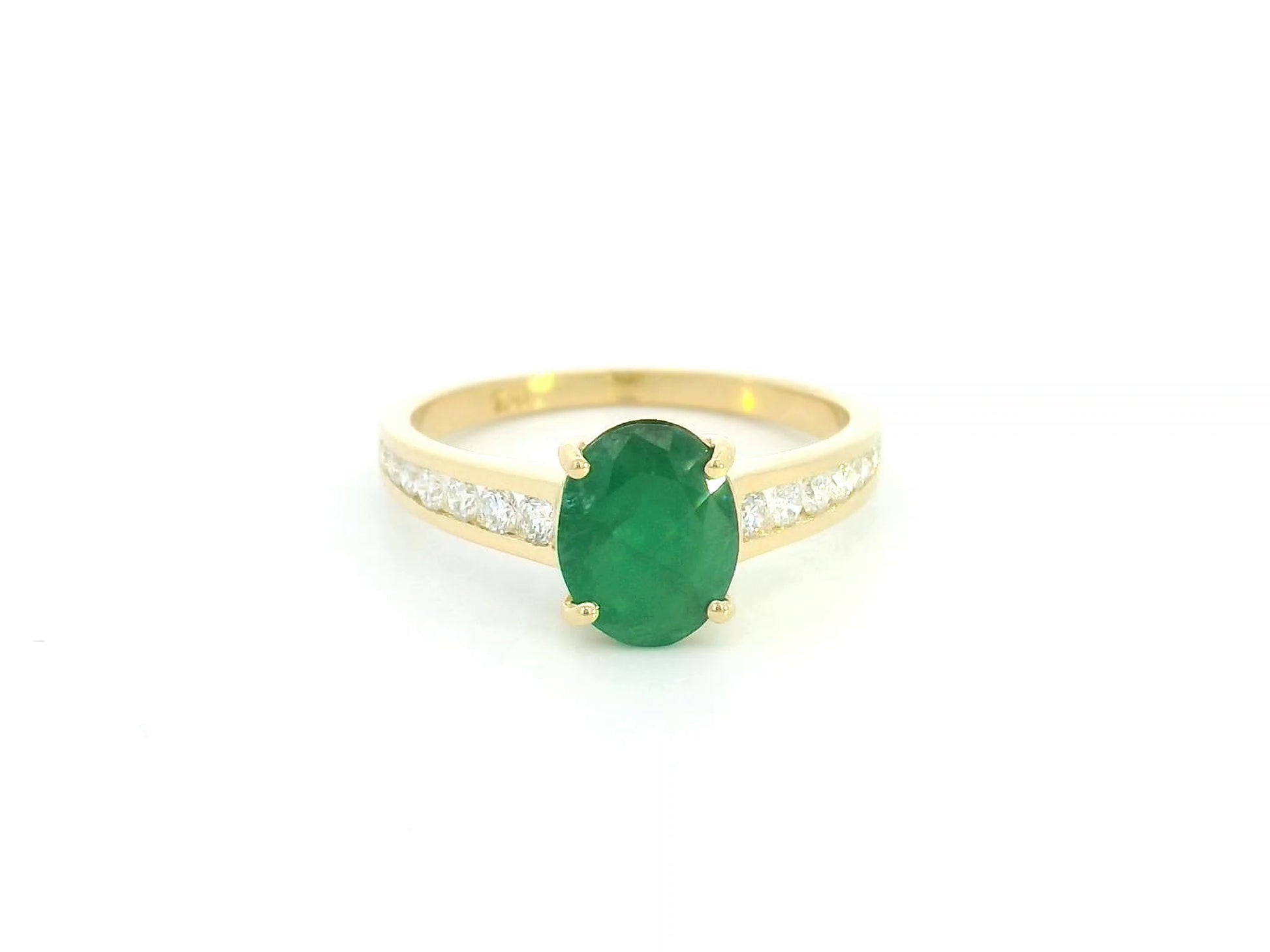 Oval emerald and diamond ring in 18K yellow gold by Emirates Diamonds