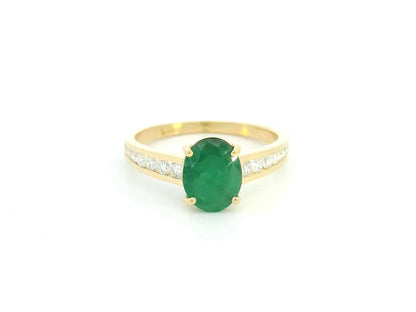 Oval emerald and diamond ring in 18K yellow gold by Emirates Diamonds