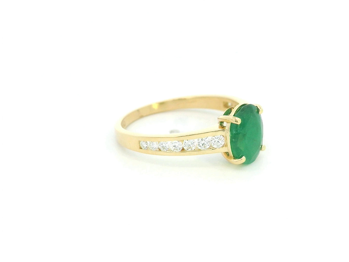 Oval emerald and diamond ring in 18K yellow gold by Emirates Diamonds