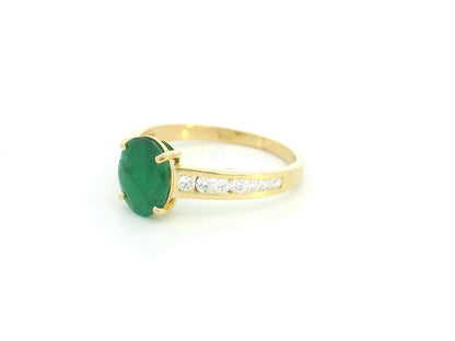 Oval emerald and diamond ring in 18K yellow gold by Emirates Diamonds
