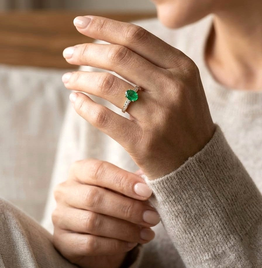 Oval emerald and diamond ring in 18K yellow gold by Emirates Diamonds