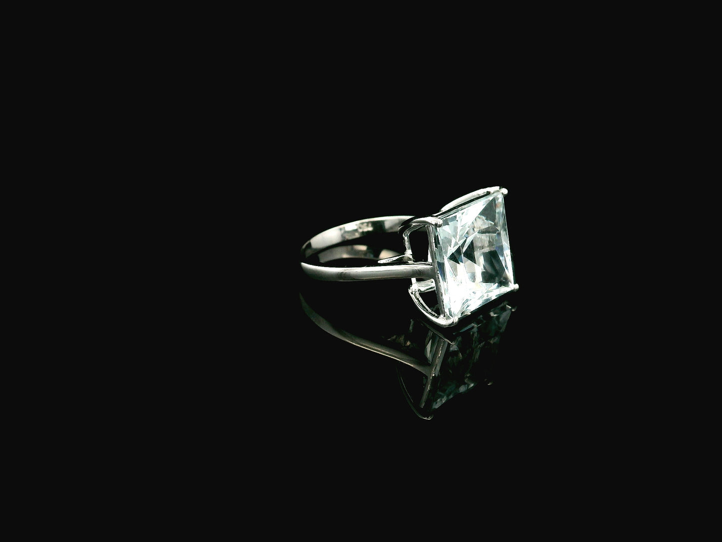 7.76 carat square aquamarine cocktail ring in 18K white gold