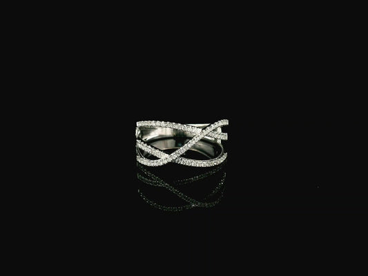 18K white gold diamond criss cross ring with pavé-set crossover bands.
