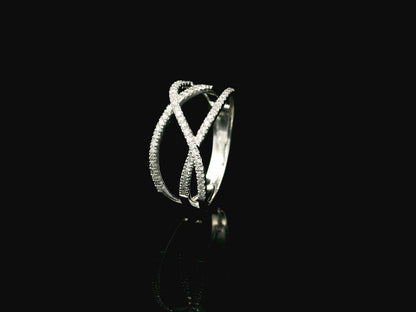 18K white gold diamond criss cross ring with pavé-set crossover bands.