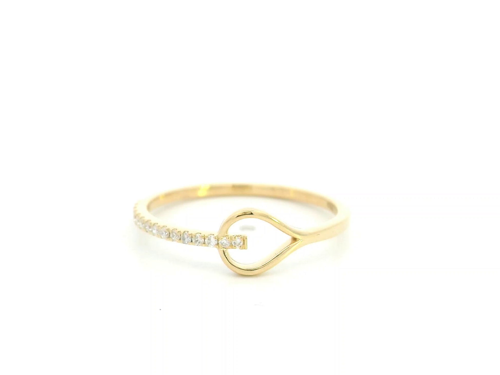 18K yellow gold open teardrop diamond ring with minimalist modern design.