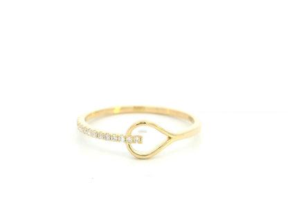 18K yellow gold open teardrop diamond ring with minimalist modern design.