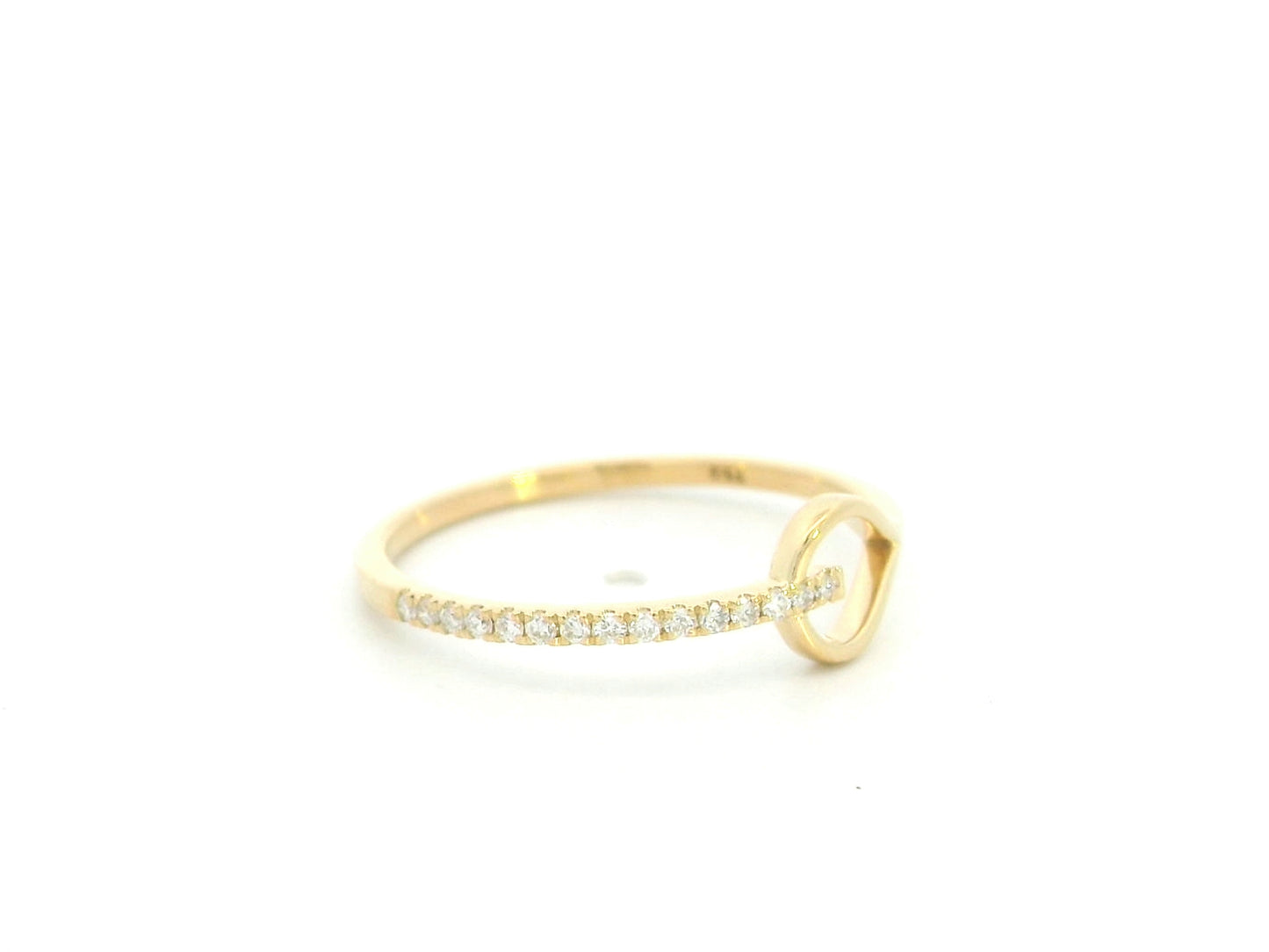 18K yellow gold open teardrop diamond ring with minimalist modern design.