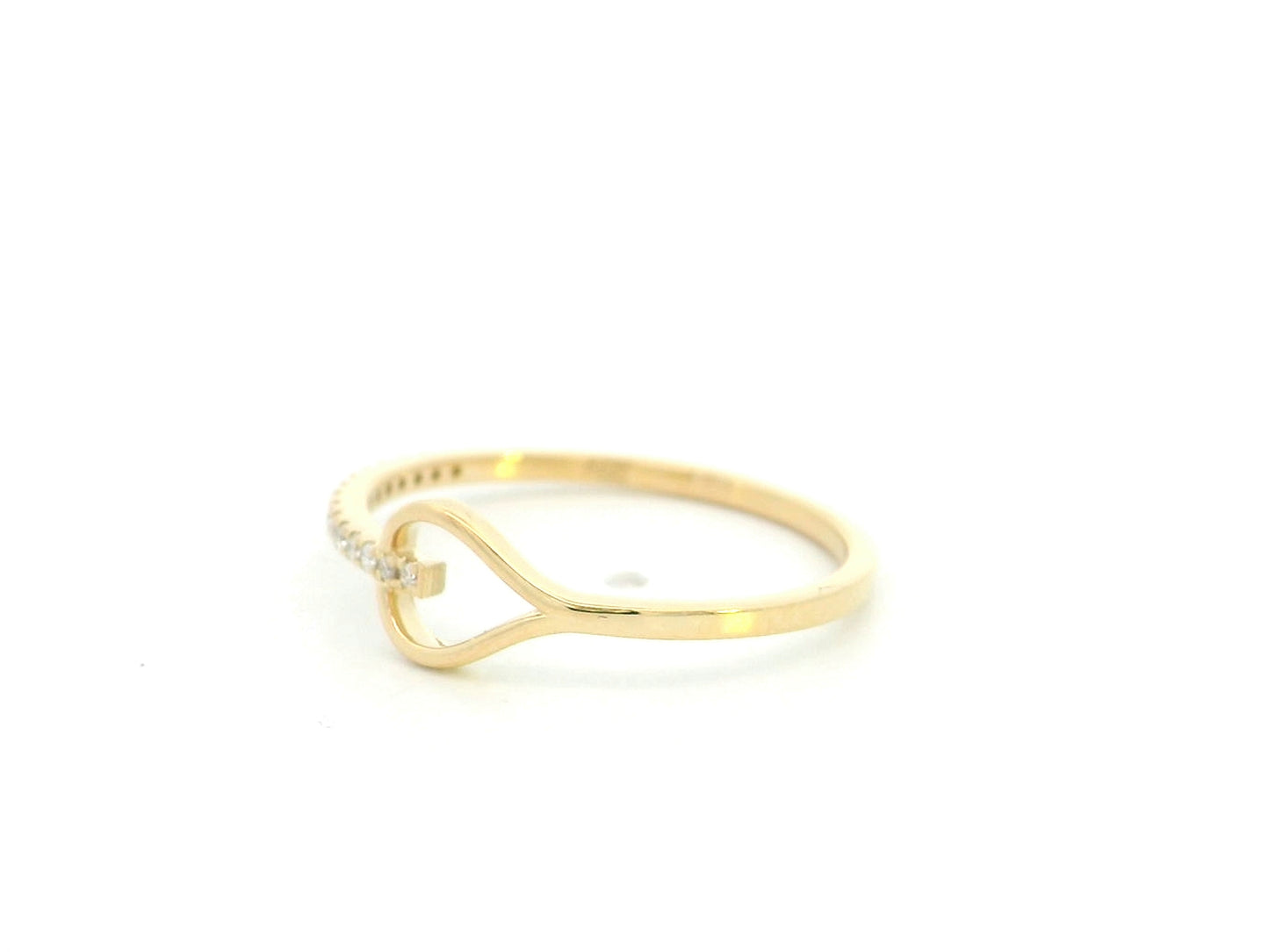 18K yellow gold open teardrop diamond ring with minimalist modern design.