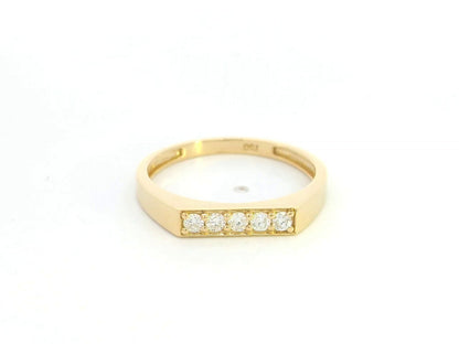18K yellow gold diamond bar band ring with modern minimalist design.