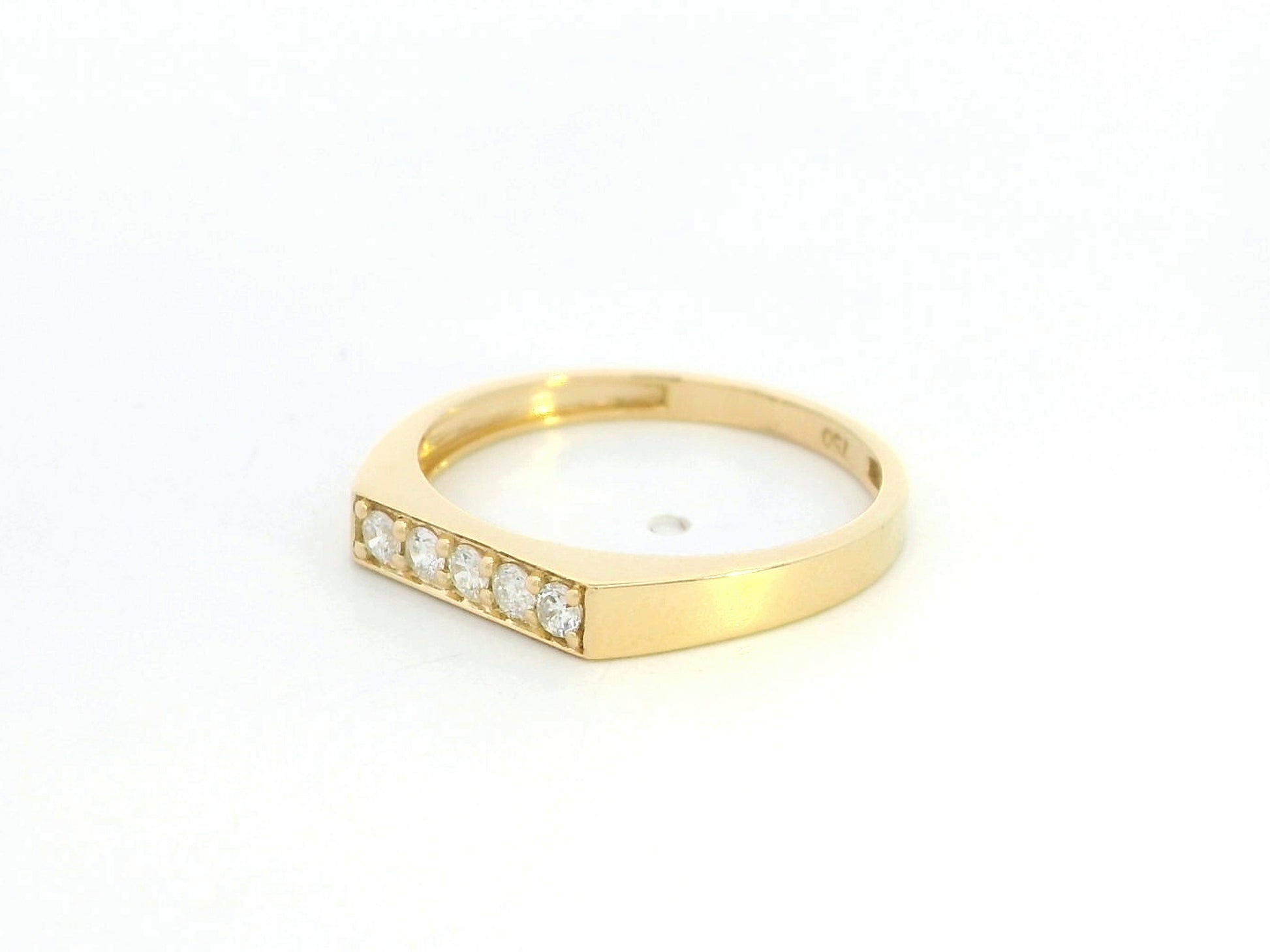 18K yellow gold diamond bar band ring with modern minimalist design.