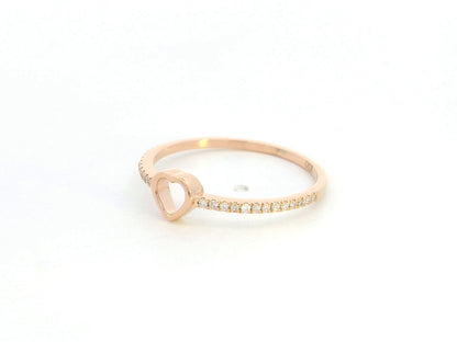 18K rose gold diamond heart ring with pavé-set diamonds and minimalist open heart design.