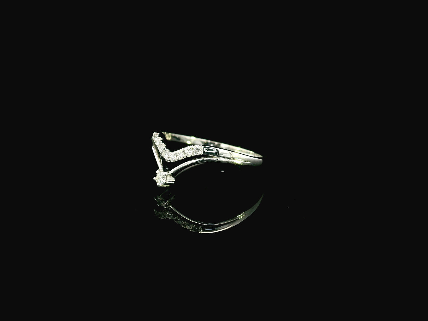 18K white gold diamond contour band ring with pavé diamonds in minimalist curved stacking design