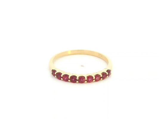 Ruby band ring in 18K yellow gold with natural ruby gemstones