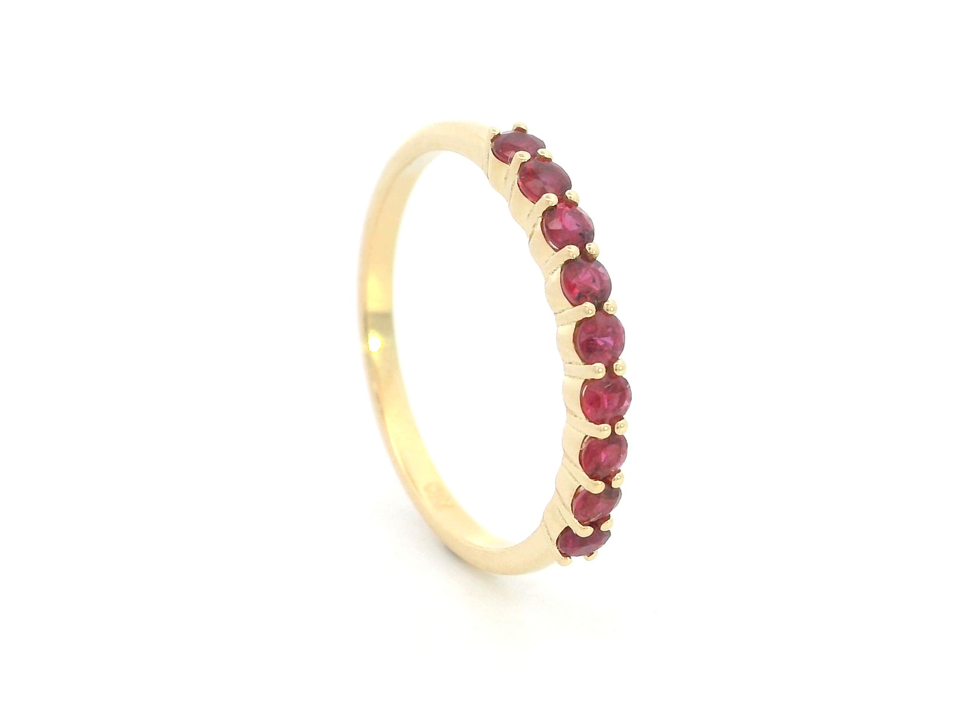 Ruby band ring in 18K yellow gold with natural ruby gemstones