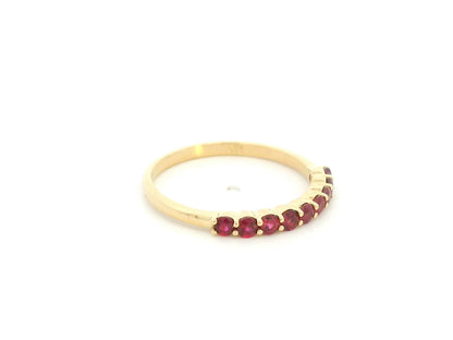 Ruby band ring in 18K yellow gold with natural ruby gemstones