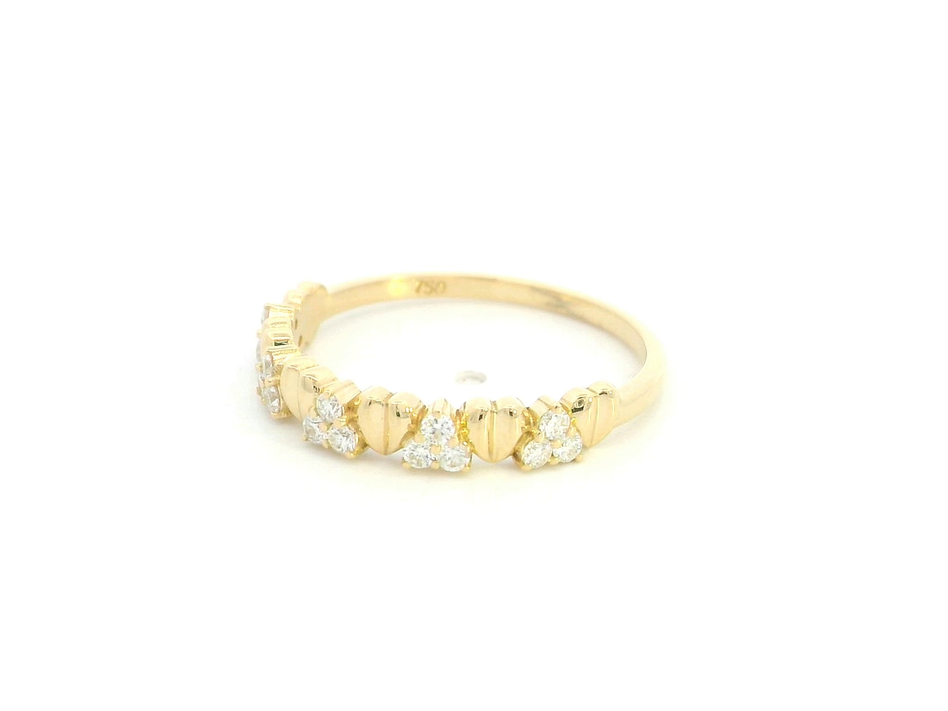 18K yellow gold diamond heart ring featuring alternating heart motifs and diamond clusters with a total diamond weight of 0.21 carat.