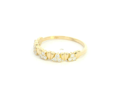 18K yellow gold diamond heart ring featuring alternating heart motifs and diamond clusters with a total diamond weight of 0.21 carat.
