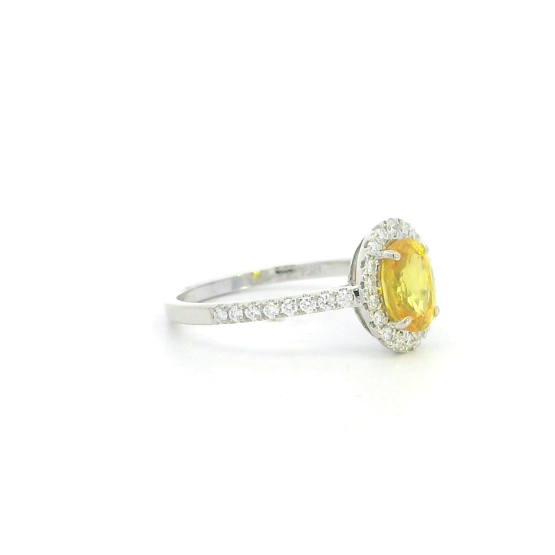 18K white gold oval yellow sapphire halo ring with diamond band and natural diamonds