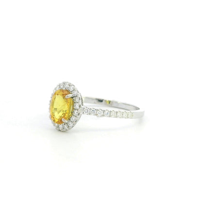 18K white gold oval yellow sapphire halo ring with diamond band and natural diamonds