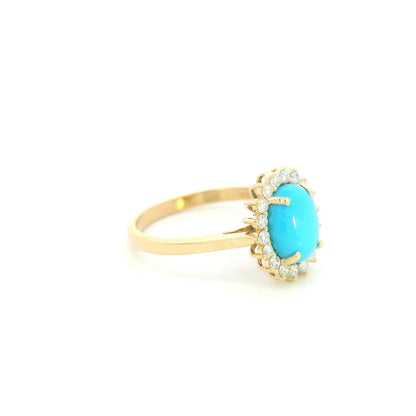 18K yellow gold turquoise and diamond halo ring with oval cabochon gemstone