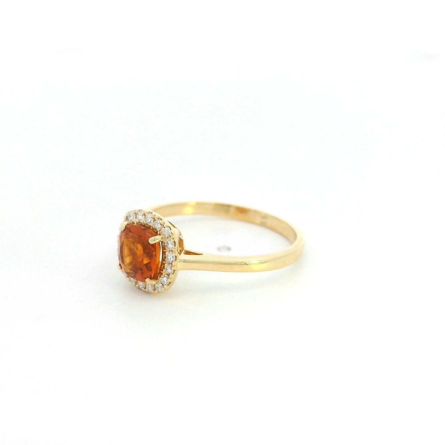Cushion cut citrine halo ring in 18K yellow gold with diamond accents
