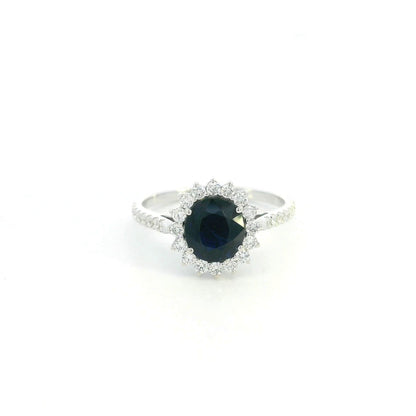 18K white gold blue sapphire and diamond halo ring with pavé diamond band
