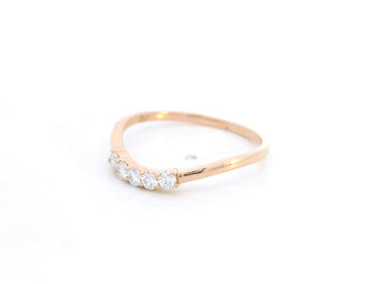 Diamond contour band ring in 18K rose gold by Emirates Diamonds