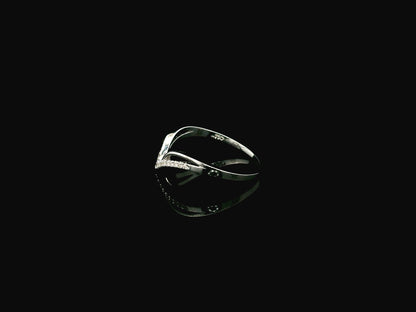 18K white gold chevron diamond ring featuring 0.10 carat natural diamonds in a V-shaped contour design.