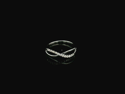 18K white gold diamond crossover ring featuring a crisscross design with 0.16 carat natural diamonds and polished white gold bands.