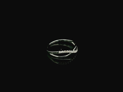 18K white gold diamond crossover ring featuring a crisscross design with 0.16 carat natural diamonds and polished white gold bands.