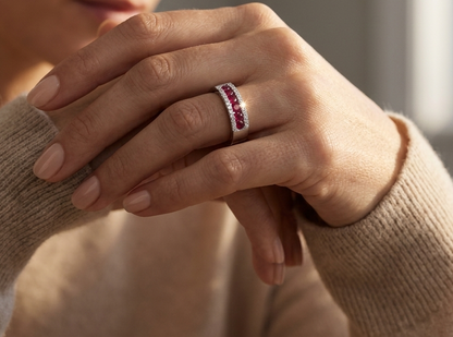Ruby and diamond channel set ring in 18K white gold featuring 0.51 carat natural rubies and 0.12 carat diamonds