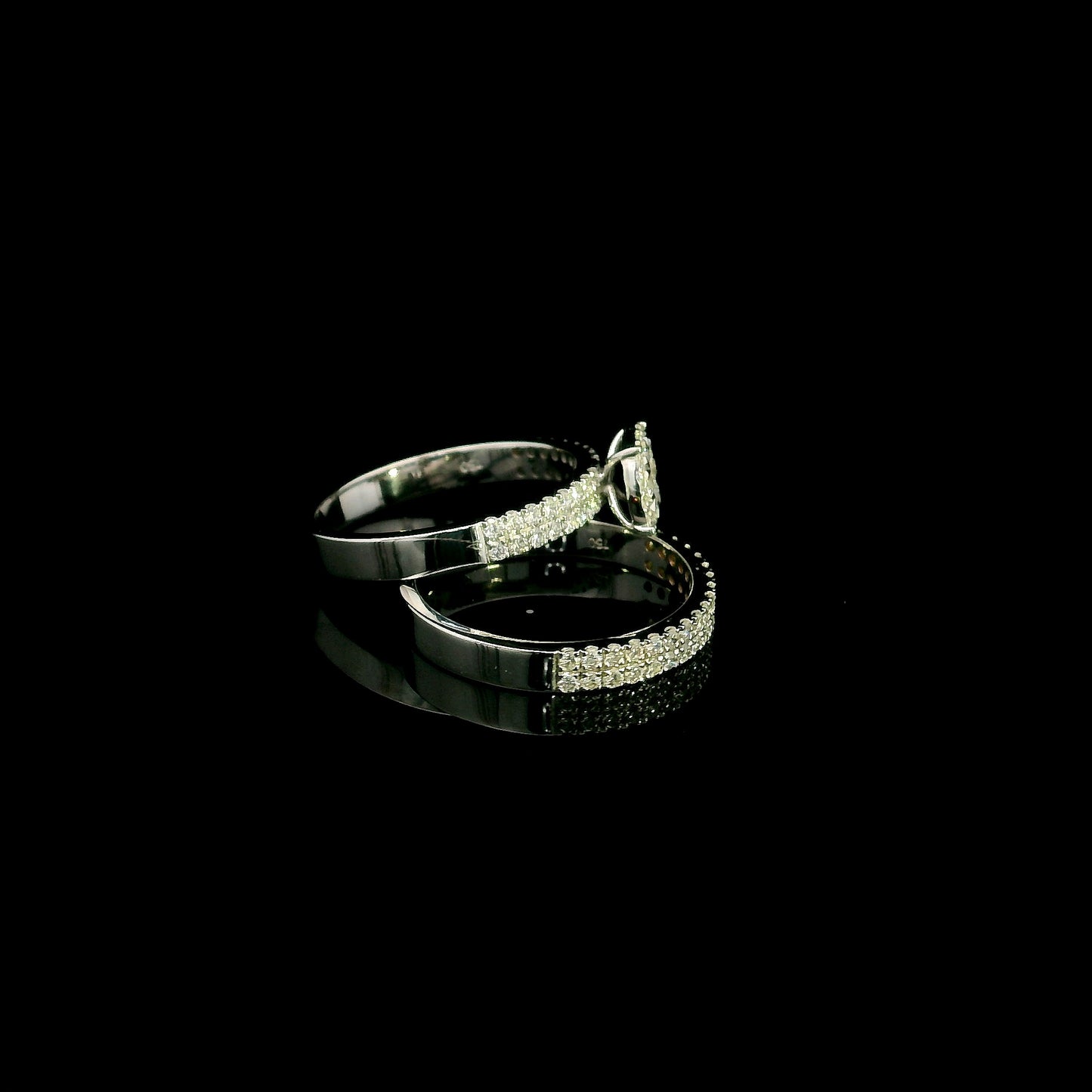 18K white gold diamond bridal set featuring a diamond cluster engagement ring and matching wedding band with 0.92 carat natural diamonds.