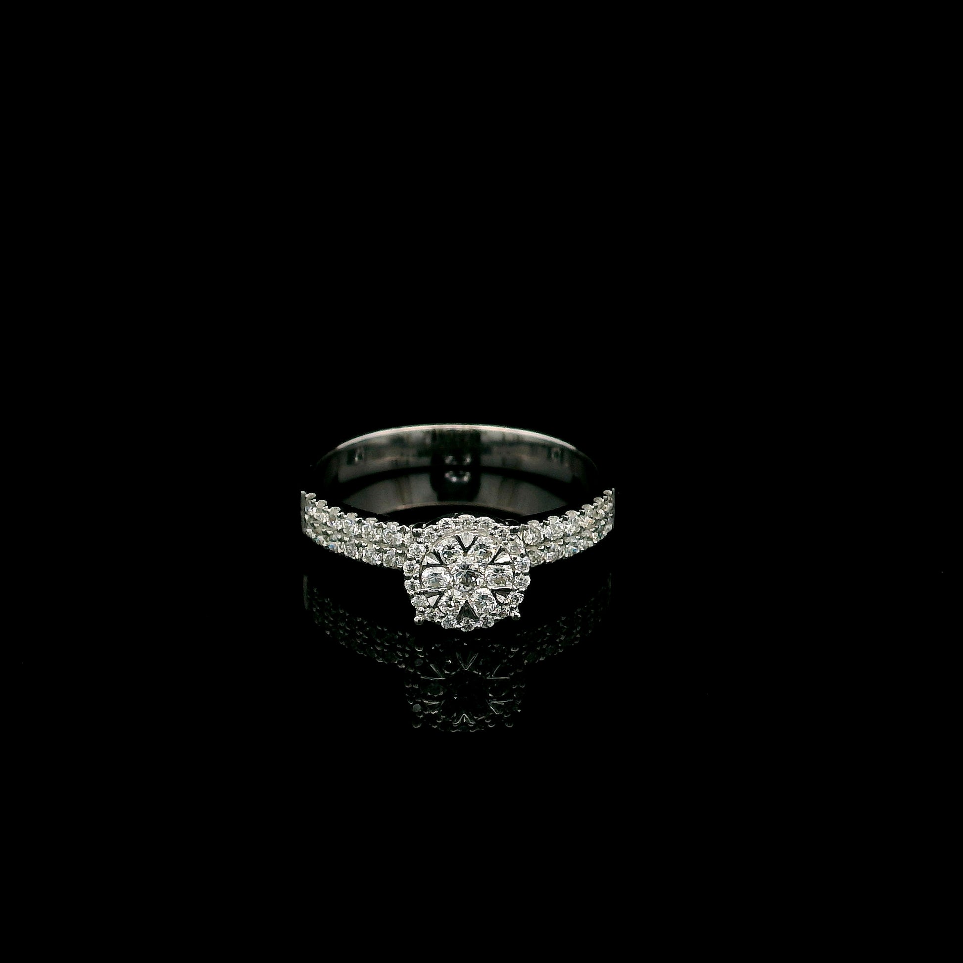 18K white gold diamond bridal set featuring a diamond cluster engagement ring and matching wedding band with 0.92 carat natural diamonds.