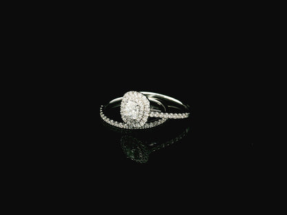 GIA certified cushion cut diamond bridal ring set in 18K white gold with halo engagement ring and matching diamond wedding band.