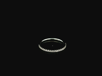 GIA certified cushion cut diamond bridal ring set in 18K white gold with halo engagement ring and matching diamond wedding band.