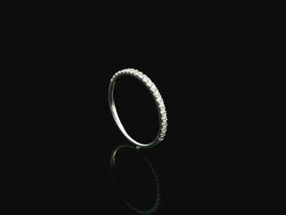 GIA certified cushion cut diamond bridal ring set in 18K white gold with halo engagement ring and matching diamond wedding band.