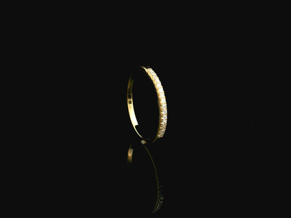 Diamond half eternity wedding band in 18K yellow gold with 0.14 carat natural diamonds