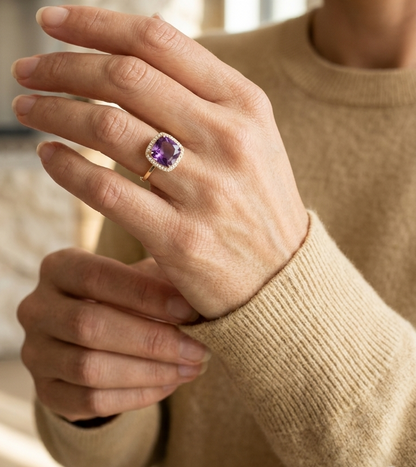 18K yellow gold cushion-cut amethyst halo ring with natural diamond accents.