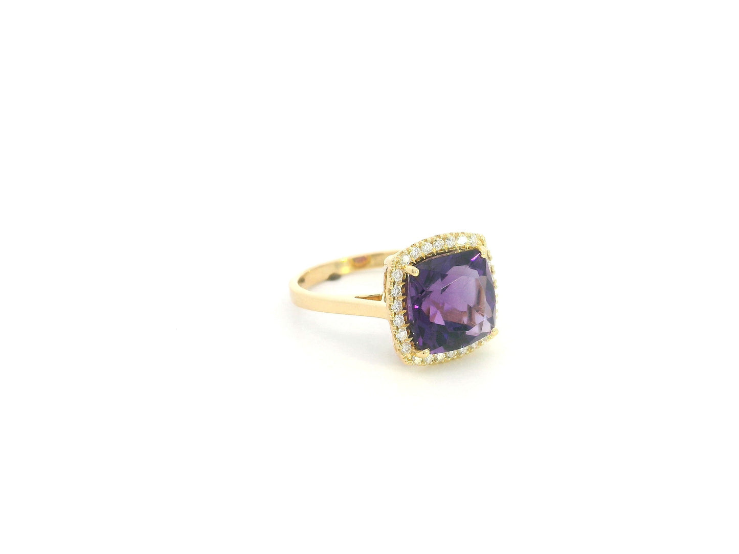 18K yellow gold cushion-cut amethyst halo ring with natural diamond accents.