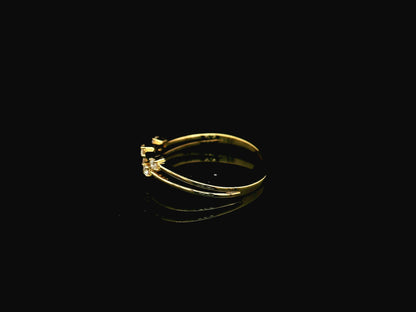 18K yellow gold split-band ring featuring five natural diamonds with a modern floating diamond design.