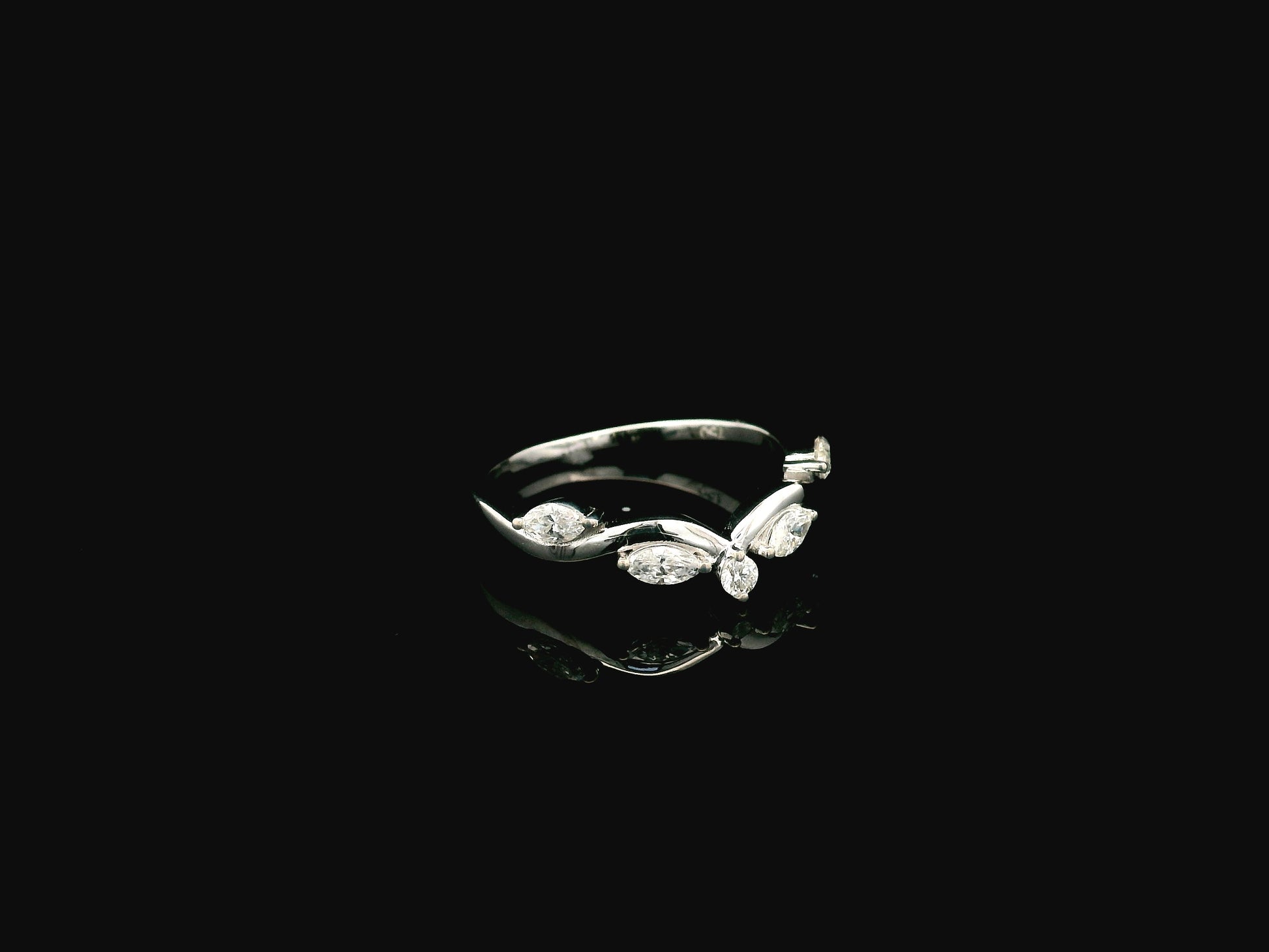 Marquise diamond contour wedding band in 18K white gold designed as a curved ring enhancer with 0.44 carat diamonds.