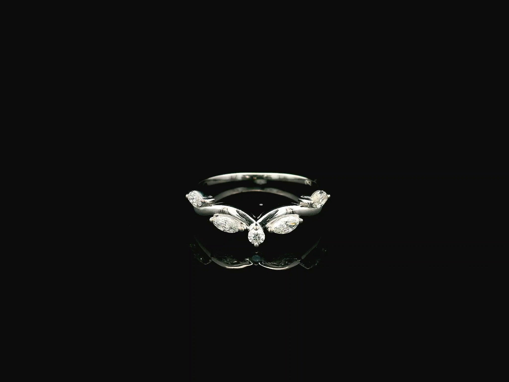 Marquise diamond contour wedding band in 18K white gold designed as a curved ring enhancer with 0.44 carat diamonds.