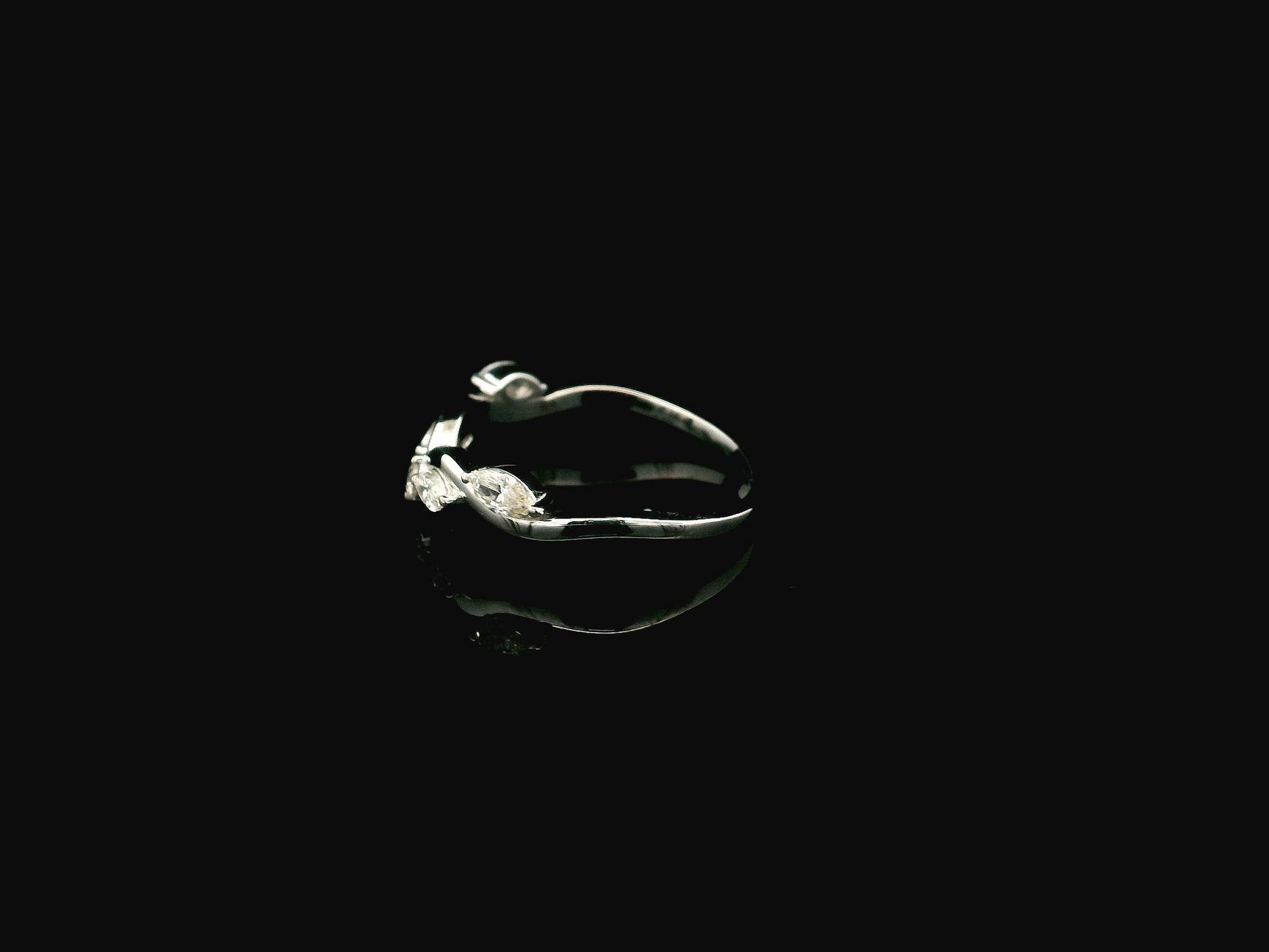 Marquise diamond contour wedding band in 18K white gold designed as a curved ring enhancer with 0.44 carat diamonds.
