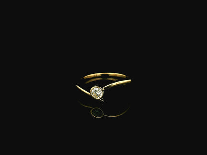 18K yellow gold bezel set diamond solitaire ring with 0.18 carat natural diamond