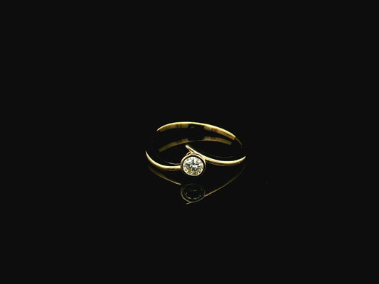 18K yellow gold bezel set diamond solitaire ring with 0.18 carat natural diamond