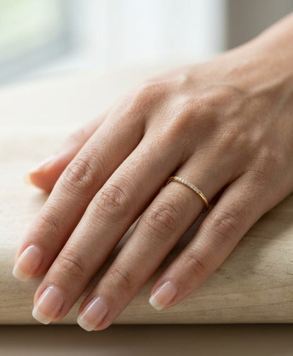 18K yellow gold slim diamond stacking ring featuring 0.06 carat natural diamonds in a minimalist band design