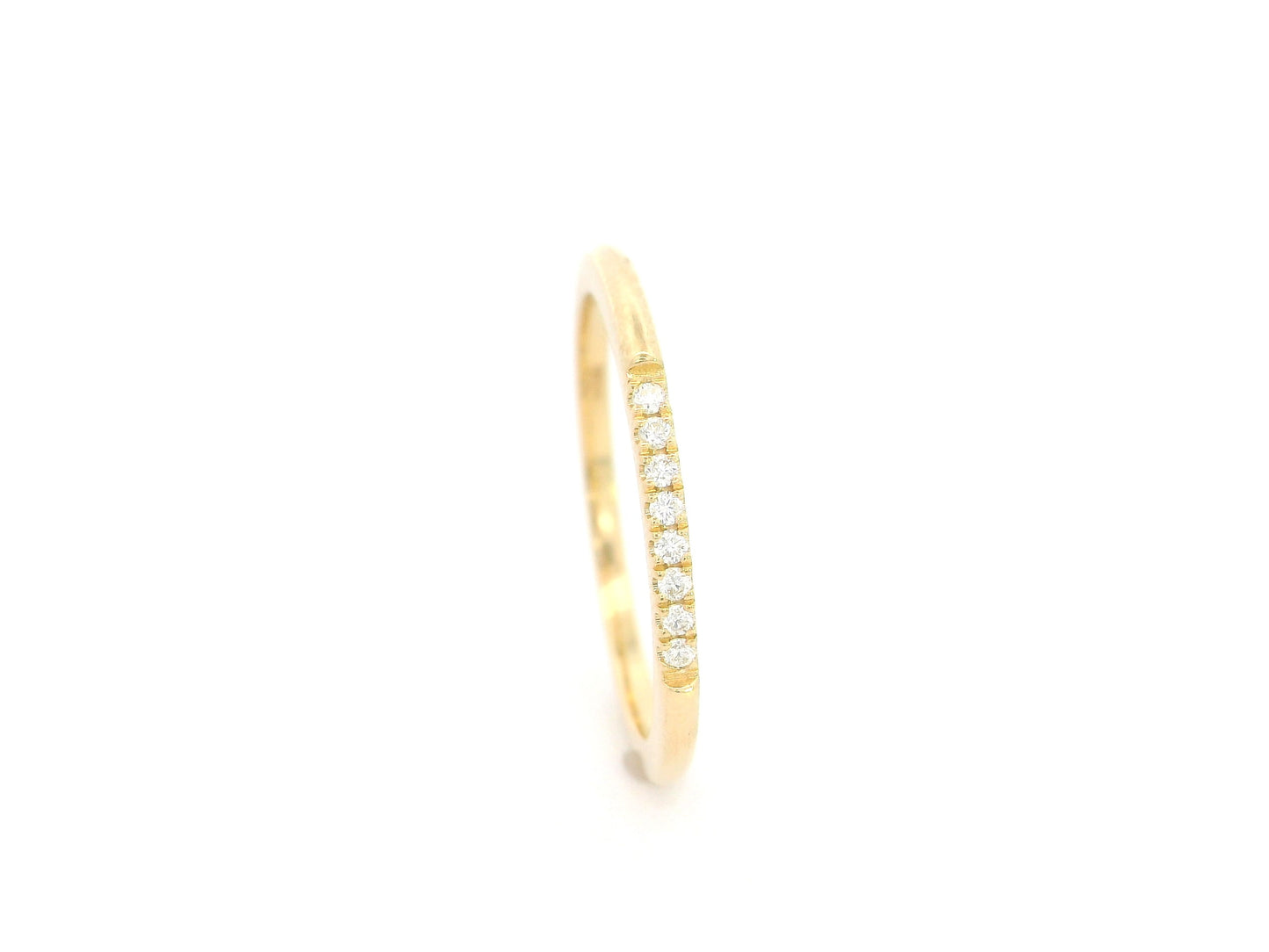 18K yellow gold slim diamond stacking ring featuring 0.06 carat natural diamonds in a minimalist band design
